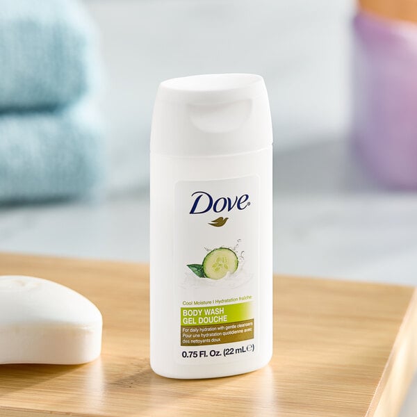 A small 0.75 oz bottle of Dove Cool Moisture Cucumber body wash designed for hotel and motel use.