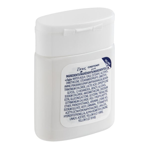 A small white bottle of Dove Hydrating Care conditioner intended for hotel or motel use.