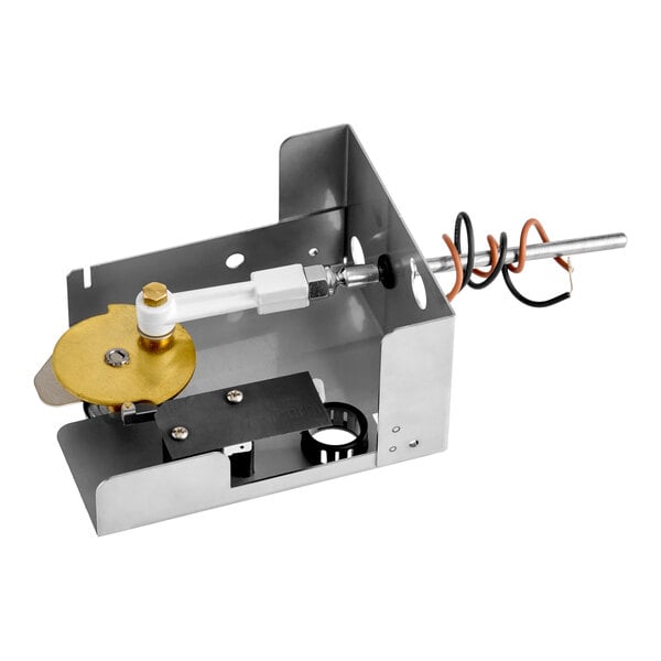 A metal Ice-O-Matic harvest kit assembly with electrical components and a brass disc, designed for ice machines.