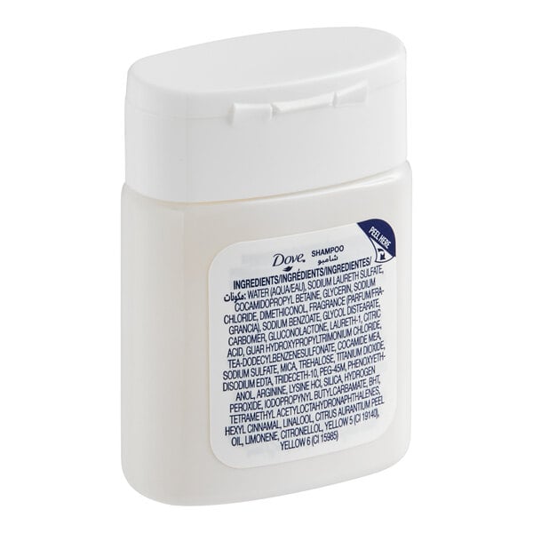 A small white bottle of Dove Hydrating Care shampoo intended for hotel or motel use.