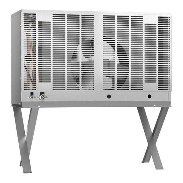 A large, rectangular, metal air-cooled remote ice machine condenser unit with a grated front and angled support legs.