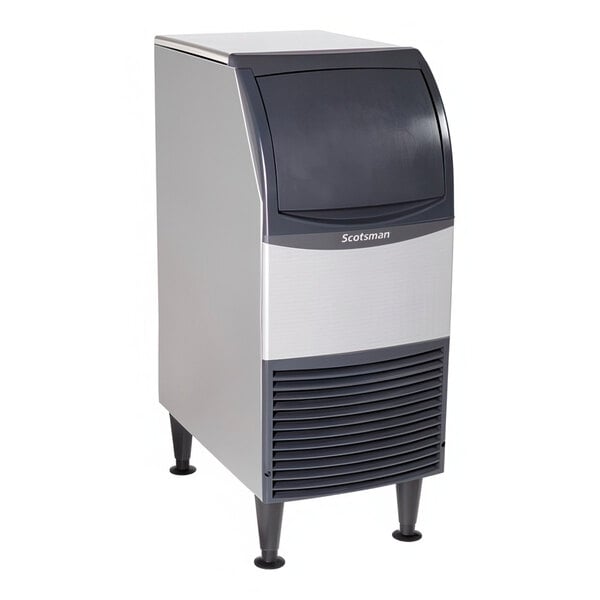 A commercial undercounter flake ice machine with a built-in storage bin.
