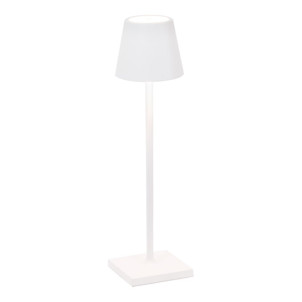 A small white cordless rechargeable table lamp with a square base and conical shade.
