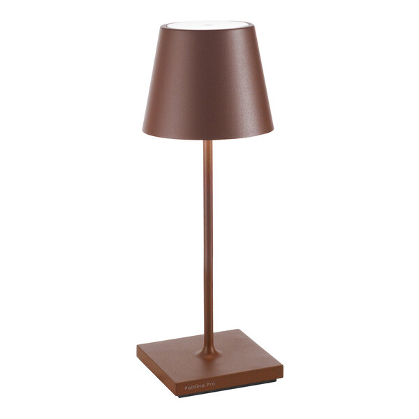 A small rust-colored cordless rechargeable table lamp with a square base and conical shade.