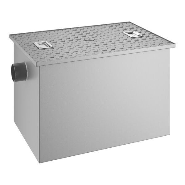 A rectangular metal grease trap with a textured lid and side pipe connection.