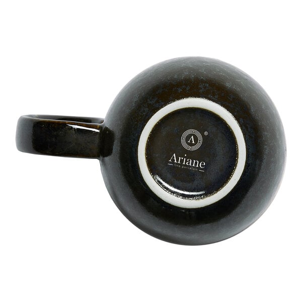 A black porcelain coupe mug with a handle, shown from the bottom with the Ariane brand logo visible.