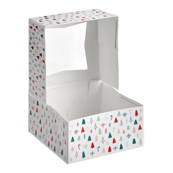 A white bakery box with a clear window and a modern Christmas tree print design.