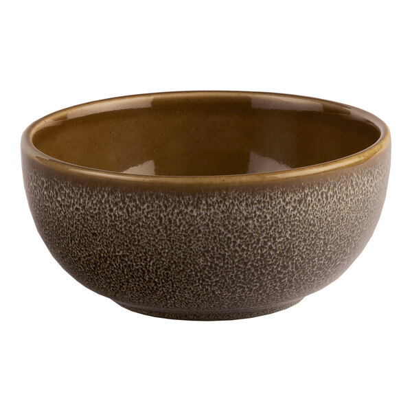 A brown round porcelain coupe bowl with a speckled exterior.