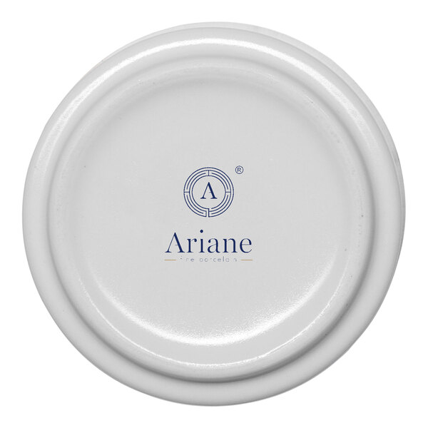 A round porcelain ramekin with a white base and the Ariane logo printed on the bottom.