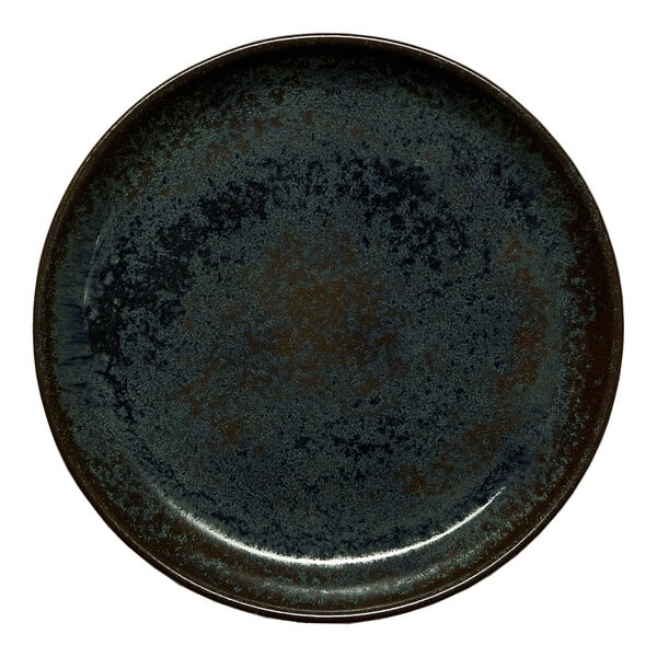 A round black porcelain coupe flat plate.