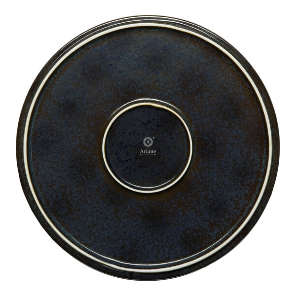 A black round porcelain plate with a raised rim, viewed from above.