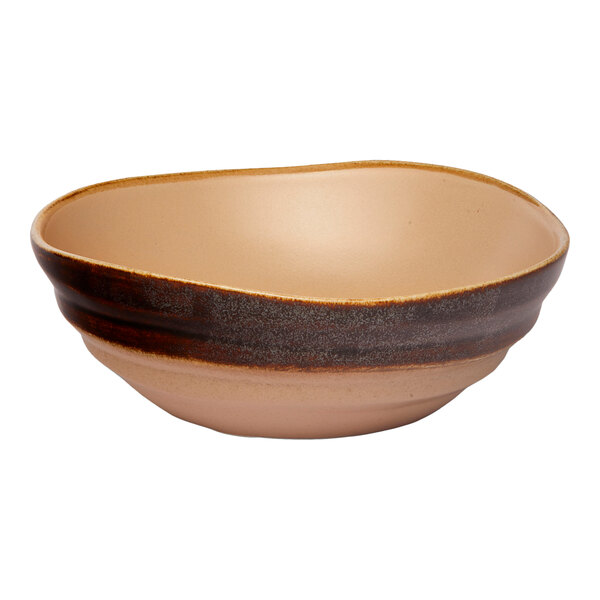 A brown round irregular porcelain bowl with a matte finish.