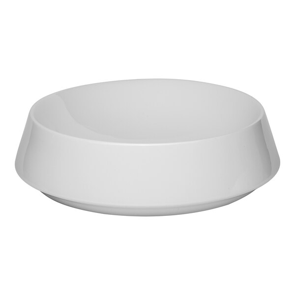 A round ivory porcelain coupe bowl with a wide rim.