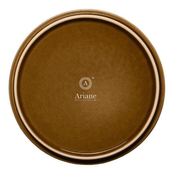 A brown round porcelain plate with a raised rim.