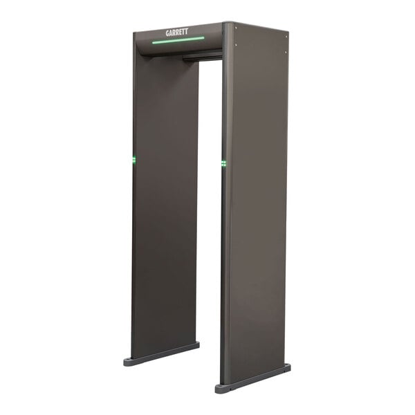 A walk-through metal detector with a rectangular frame and ADA-compliant design.