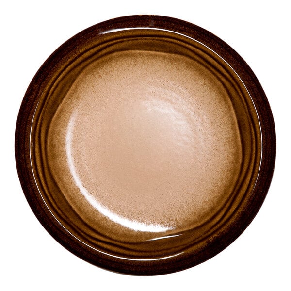 A round brown porcelain plate with a wide rim.