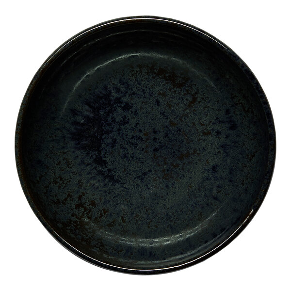 A black round embossed porcelain coupe bowl.