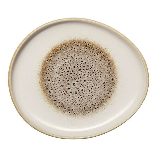 An irregular oval porcelain platter with a raised rim, featuring a brown and cream speckled design.