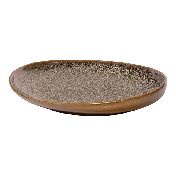 An oval brown porcelain platter with an irregular raised rim.
