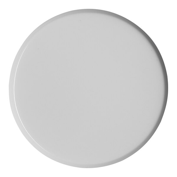 A round ivory porcelain plate.