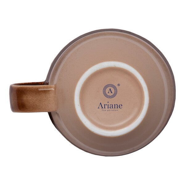 A brown porcelain mug with a handle, viewed from the bottom, featuring the Ariane brand logo.