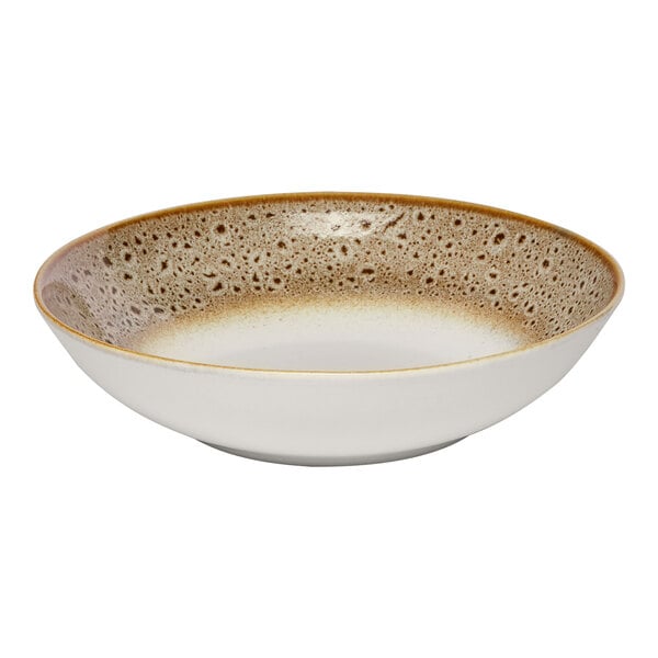 A round porcelain deep coupe plate with a brown and cream spotted rim.