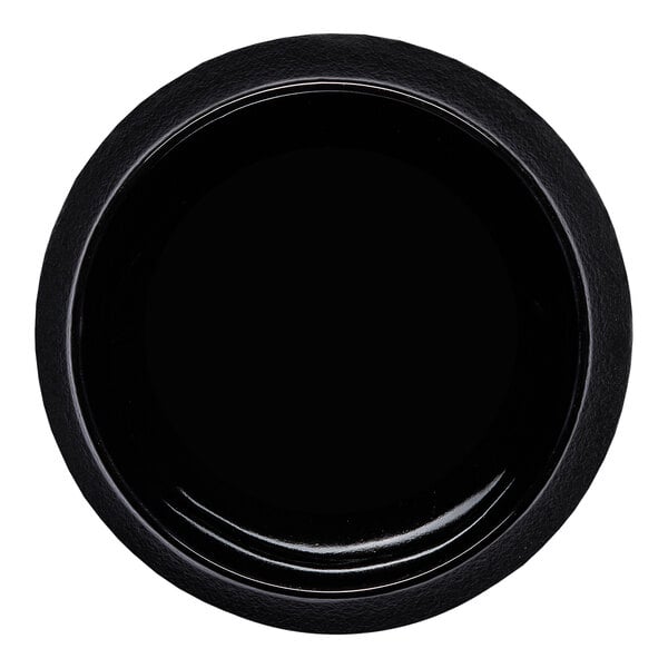 A black round porcelain coupe bowl.