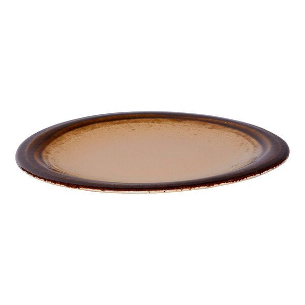 A brown round wide rim porcelain flat plate.