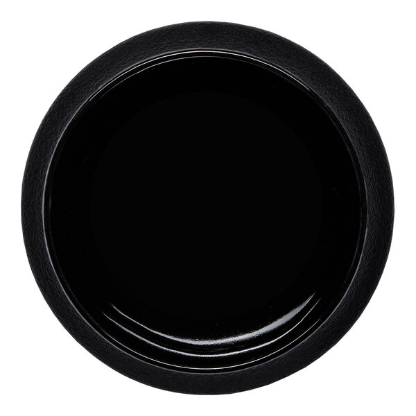 A black round porcelain coupe bowl.