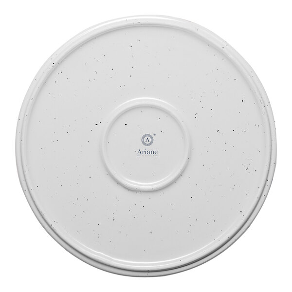 A white round porcelain plate with a raised rim and subtle speckled pattern.