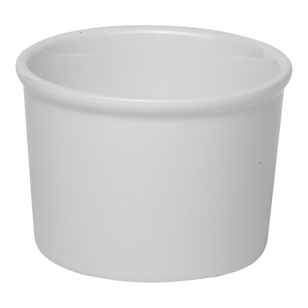 A small, round, ivory porcelain dessert bowl.