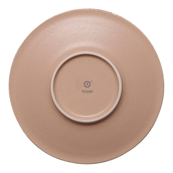 A round brown porcelain coupe saucer with a raised center and the brand name Ariane on the bottom.