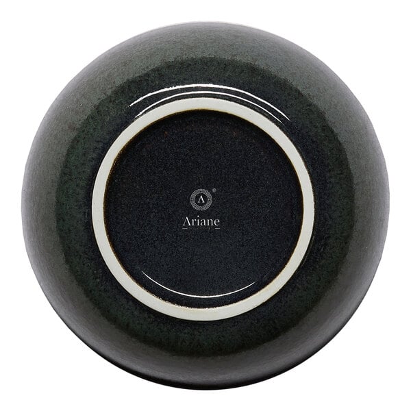 A black round embossed porcelain coupe bowl shown upside down with the brand name Ariane visible on the bottom.