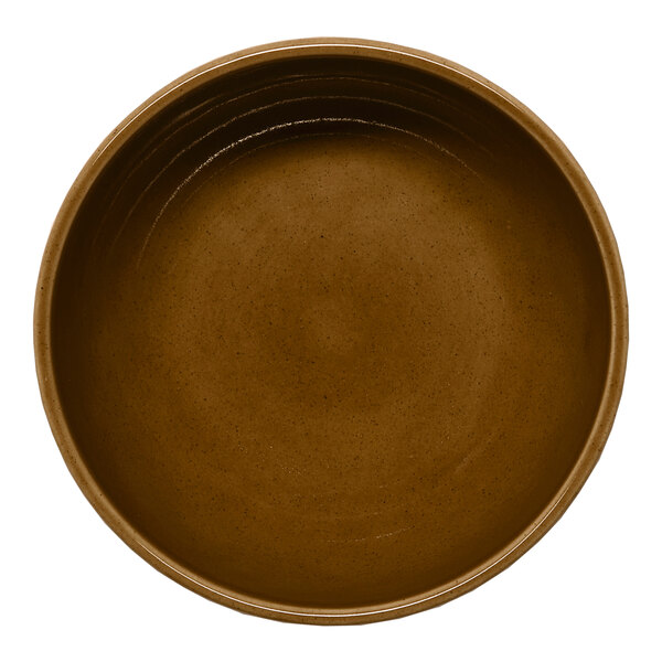 A brown round porcelain coupe bowl.