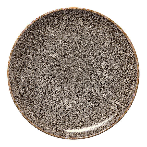A round, brown, rimless porcelain coupe plate with a speckled pattern.