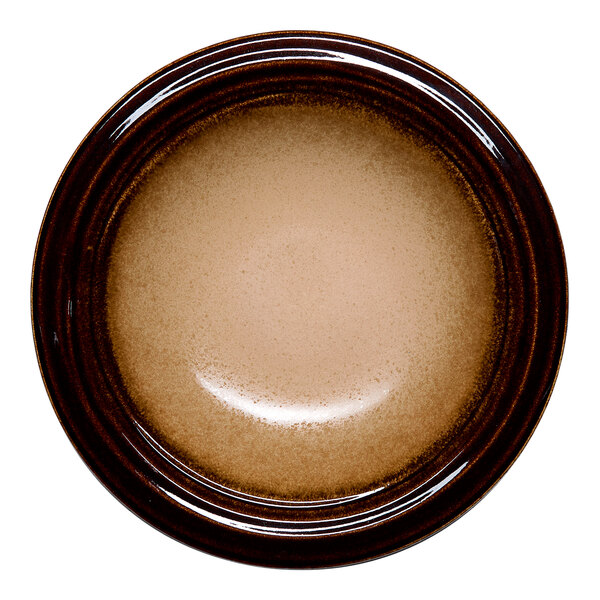 A round brown porcelain embossed coupe deep plate.