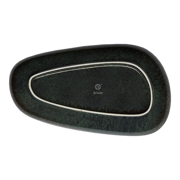 An asymmetric black oval porcelain coupe platter.