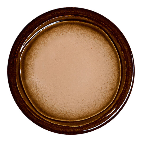 A round brown porcelain plate with a wide rim.