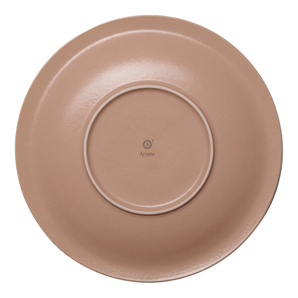 A brown round wide rim porcelain flat plate.