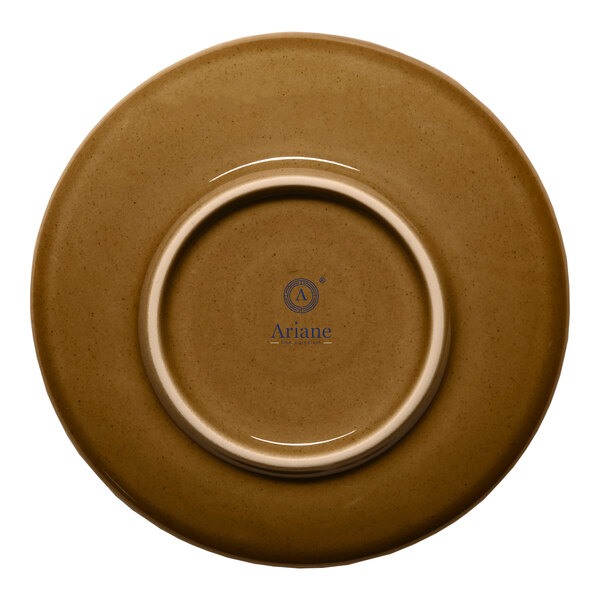 A brown round porcelain espresso cup saucer with a coupe design.