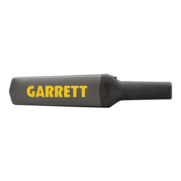 A handheld Garrett Guide metal detector with a black body and yellow lettering.