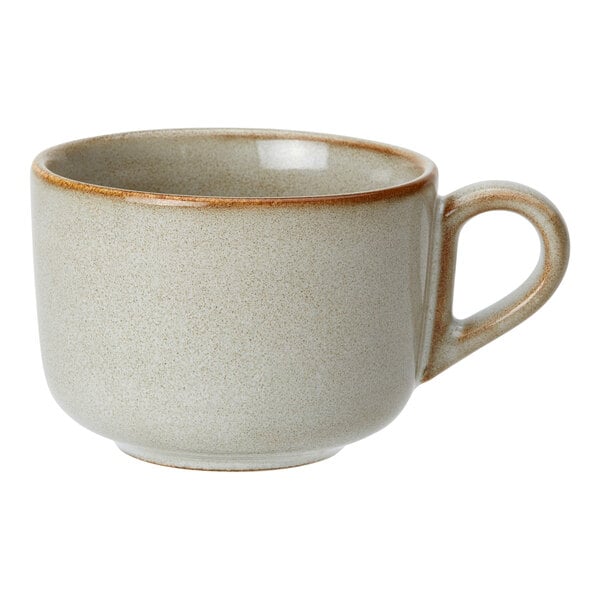 A beige porcelain coffee or tea cup with a handle and a slightly darker rim.
