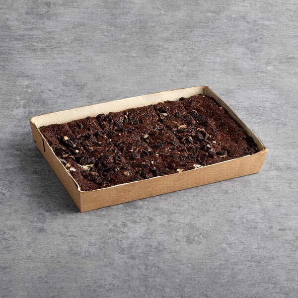 A rectangular tray of pre-cut Oreo brownie bars with a chocolate topping.