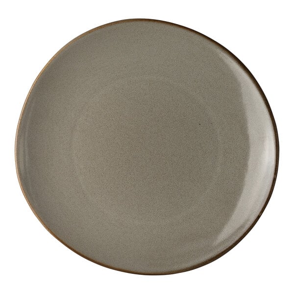 An 11-inch round porcelain coupe plate in a neutral tone from The Potter's Collection by Robert Gordon.