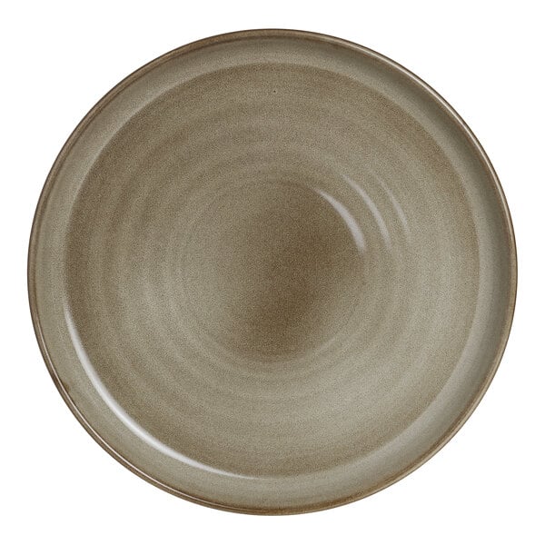 A round, beige porcelain plate with a subtle gradient design.