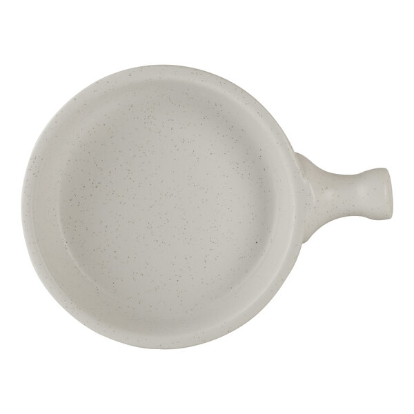 A round porcelain serving tray with a handle, featuring a speckled finish.