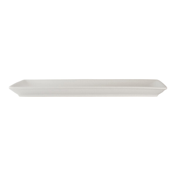 A rectangular white porcelain serving tray with slightly raised edges.