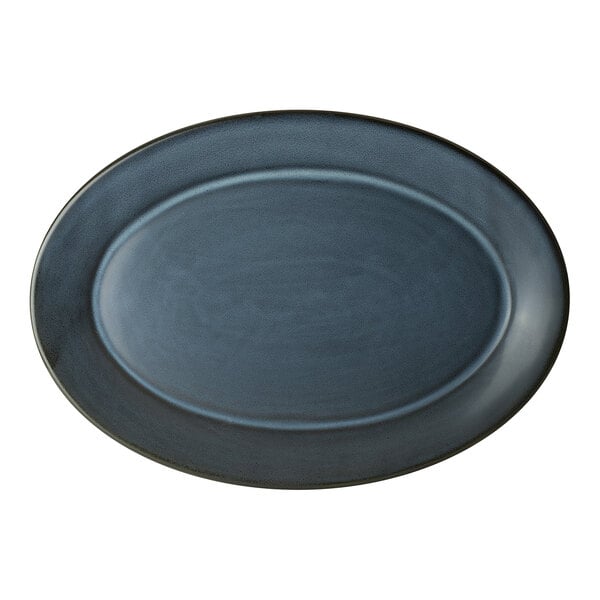 An oval-shaped, dark blue porcelain platter.