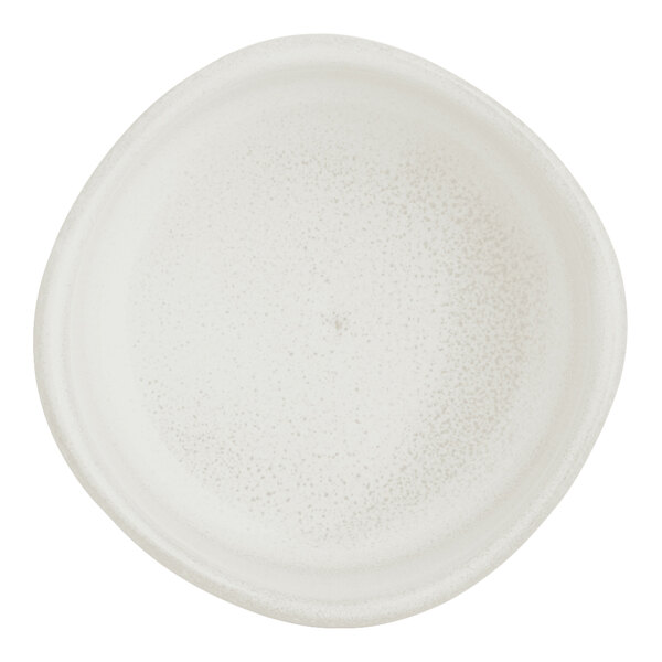 A small, round, white porcelain ramekin with a subtle speckled pattern.