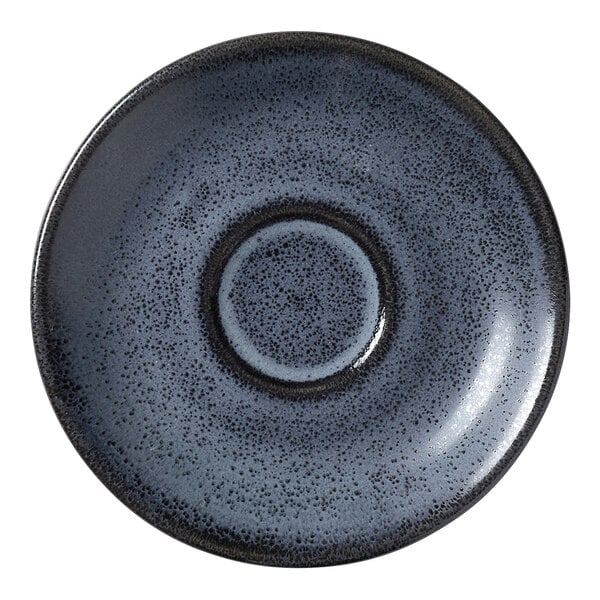 A round, dark blue speckled porcelain saucer with a central indentation, designed by Robert Gordon for Steelite International.